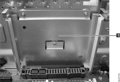The voltage regulator module guide bracket screws, internal view
