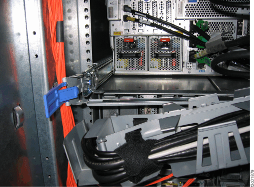 CEC enclosure cable management arm in position to remove power supply